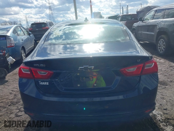 2018 Chevrolet Malibu LT z VIN 1G1ZD5ST7JF214362, wystawiony jako IAAI lot #41676417 z przebiegiem 73 908 mil mil oraz . Historia ofert i sprzedaży dostępna na DreamBid. Obrazek 16.