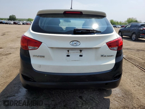 2011 Hyundai Tucson GL with VIN KM8JT3AC4BU166471, listed as a Copart auction lot 59549205 with 309,635 mi miles and Clean title. Bid and sale history available at DreamBid. Image 6.