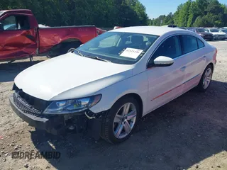 2013 Volkswagen CC Sport z VIN WVWAP7AN7DE545141, wystawiony jako IAAI lot #42325238 z przebiegiem 170 478 mil mil oraz . Historia ofert i sprzedaży dostępna na DreamBid. Obrazek 2.