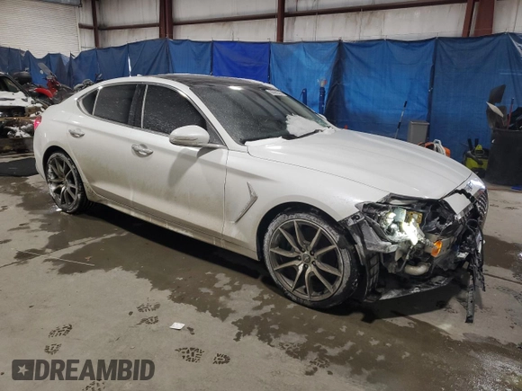 2021 Genesis G70 2.0T with VIN KMTG44LAXMU070314, listed as a Copart auction lot 88990385 with 52,517 mi miles and Salvage title. Bid and sale history available at DreamBid. Image 4.