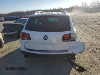 2009 Volkswagen Touareg VR6 z VIN WVGBE77L79D017480, wystawiony jako Copart lot #89344415 z przebiegiem 54 232 mil mil oraz Szkoda całkowita • Salvage title. Historia ofert i sprzedaży dostępna na DreamBid. Obrazek 6.