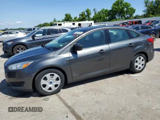 2017 Ford Focus S z VIN 1FADP3E20HL299479, wystawiony jako Copart lot #58919725 z przebiegiem 110 938 mil mil oraz Czysty tytuł • Clean title. Historia ofert i sprzedaży dostępna na DreamBid. Obrazek 1.