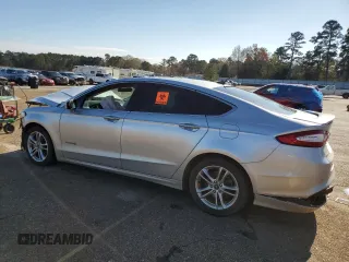 2016 Ford Fusion Titanium Hybrid with VIN 3FA6P0RU2GR114027, listed as a Copart auction lot 85223884 with Not provided miles and Salvage title. Bid and sale history available at DreamBid. Image 2.