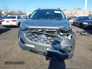 2020 Ford Edge Titanium z VIN 2FMPK4K96LBA00515, wystawiony jako IAAI lot #41757974 z przebiegiem 76 242 mil mil oraz . Historia ofert i sprzedaży dostępna na DreamBid. Obrazek 12.