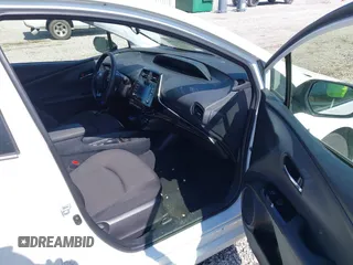 2022 Toyota Prius L Eco with VIN JTDKAMFUXN3159170, listed as a IAAI auction lot 41930288 with 53,414 mi miles and . Bid and sale history available at DreamBid. Image 5.