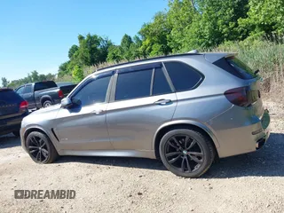 2014 BMW X5 xDrive35i z VIN 5UXKR0C5XE0K42788, wystawiony jako IAAI lot #42263399 z przebiegiem 138 644 mil mil oraz . Historia ofert i sprzedaży dostępna na DreamBid. Obrazek 14.