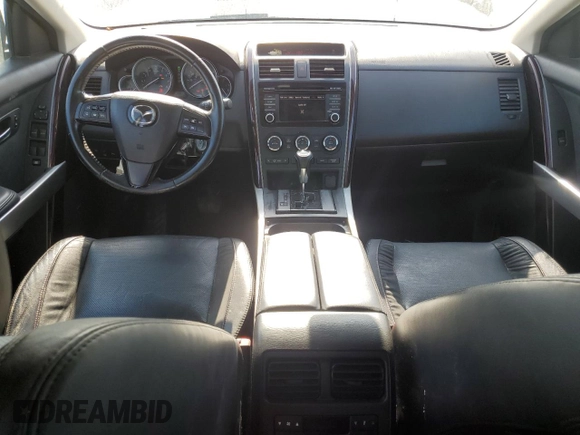 2015 Mazda CX-9 Grand Touring with VIN JM3TB2DA1F0457499, listed as a Copart auction lot 44647895 with 216,229 mi miles and Clean Title. Bid and sale history available at DreamBid. Image 8.