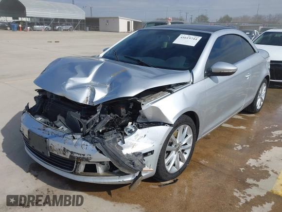 2012 Volkswagen Eos Komfort with VIN WVWBW7AH5CV005738, listed as a IAAI auction lot 41619744 with 131,340 mi miles and . Bid and sale history available at DreamBid. Image 19.