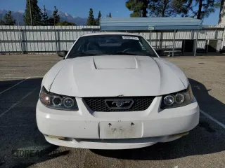 2004 Ford Mustang Standard with VIN 1FAFP404X4F105539, listed as a Copart auction lot 49404775 with 134,870 mi miles and Salvage Title. Bid and sale history available at carsss.com. Image 5.