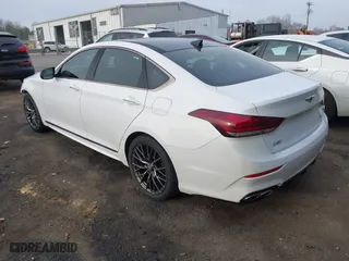2018 Genesis G80 3.3T Sport with VIN KMHGN4JB2JU218860, listed as a IAAI auction lot 41776612 with 122,766 mi miles. Bid and sale history available at carsss.com. Image 3.