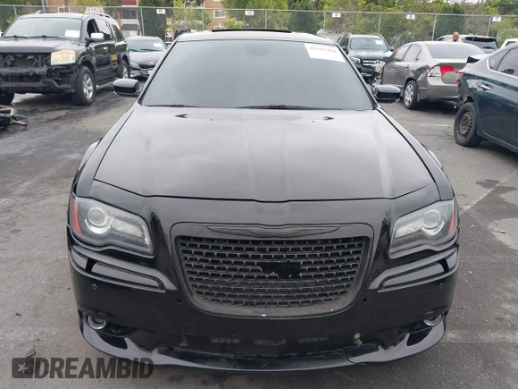 2013 Chrysler 300 SRT-8 with VIN 2C3CCAFJ9DH576184, listed as a IAAI auction lot 42162364 with 104,021 mi miles and . Bid and sale history available at carsss.com. Image 13.