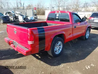 2000 Dodge Dakota SLT with VIN 1B7GL26Z6YS766872, listed as a IAAI auction lot 41854532 with 199,430 mi miles and . Bid and sale history available at DreamBid. Image 4.