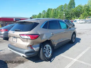2021 Ford Escape SE with VIN 1FMCU0G67MUA00194, listed as a IAAI auction lot 42406942 with 62,553 mi miles and . Bid and sale history available at DreamBid. Image 4.