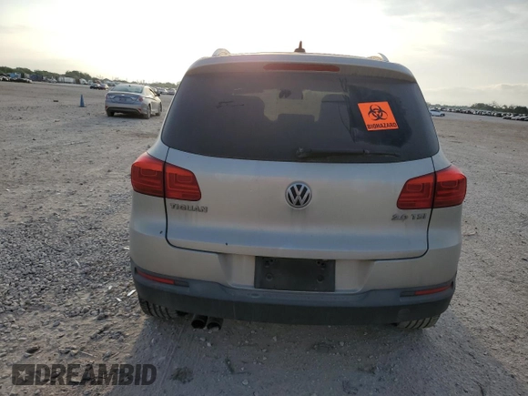 2012 Volkswagen Tiguan SEL with VIN WVGAV7AX2CW529098, listed as a Copart auction lot 53349565 with 128,603 mi miles and Salvage Title. Bid and sale history available at DreamBid. Image 6.