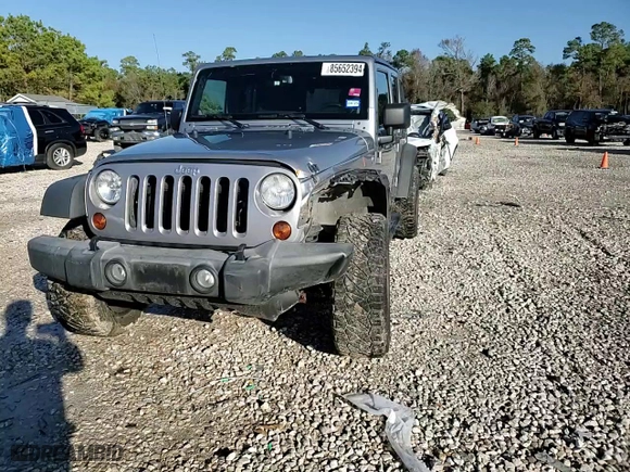2013 Jeep Wrangler Unlimited Sport with VIN 1C4BJWDG2DL642935, listed as a Copart auction lot 85652394 with 196,547 mi miles and Salvage Title. Bid and sale history available at carsss.com. Image 14.