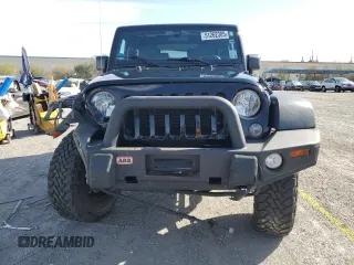 2017 Jeep Wrangler Sport with VIN 1C4AJWAGXHL715362, listed as a Copart auction lot 51262305 with 62,297 mi miles and Salvage Title. Bid and sale history available at DreamBid. Image 5.