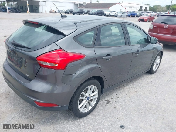 2017 Ford Focus SE with VIN 1FADP3K25HL278910, listed as a IAAI auction lot 41981105 with 94,808 mi miles. Bid and sale history available at carsss.com. Image 4.