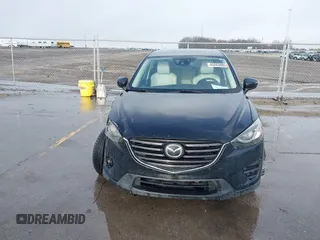 2016 Mazda CX-5 Grand Touring with VIN JM3KE4DY3G0769448, listed as a IAAI auction lot 41947725 with 154,051 mi miles and . Bid and sale history available at carsss.com. Image 12.