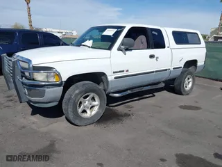 1999 Dodge Ram 1500 with VIN 1B7HF13ZXXJ600062, listed as a IAAI auction lot 41885520 with 217,643 mi miles. Bid and sale history available at carsss.com. Image 2.