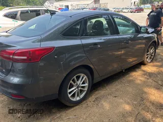 2017 Ford Focus SE with VIN 1FADP3F23HL200927, listed as a Copart auction lot 60996055 with Not provided miles and Clean title. Bid and sale history available at DreamBid. Image 4.