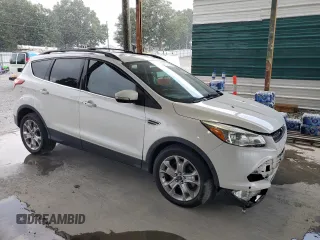 2013 Ford Escape SEL с VIN 1FMCU0H91DUB90163, выставлен на аукционе Copart как лот 64091785 с пробегом 156 038 миль миль и Списание • Salvage title. История ставок и продаж доступна на DreamBid. Изображение 4.