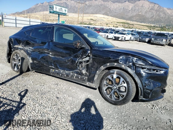 2021 Ford Mustang Mach-E Premium with VIN 3FMTK3SS5MMA01294, listed as a Copart auction lot 77201384 with 42,896 mi miles and Salvage Title. Bid and sale history available at DreamBid. Image 4.