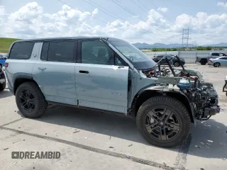 2025 Rivian R1S Adventure z VIN 7PDSGBBA2SN051004, wystawiony jako Copart lot #58999005 z przebiegiem 786 mil mil oraz Szkoda całkowita • Salvage title. Historia ofert i sprzedaży dostępna na DreamBid. Obrazek 4.