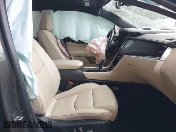 2019 Cadillac XT5 Luxury AWD with VIN 1GYKNDRS9KZ181274, listed as a IAAI auction lot 40452835 with 67,364 mi miles and . Bid and sale history available at carsss.com. Image 5.