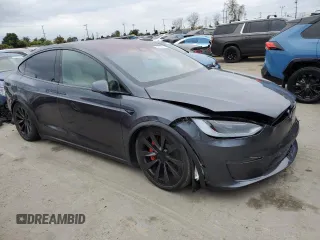 2023 Tesla Model X Plaid with VIN 7SAXCBE62PF405922, listed as a Copart auction lot 53826915 with 1,358 mi miles and Salvage Title. Bid and sale history available at DreamBid. Image 4.