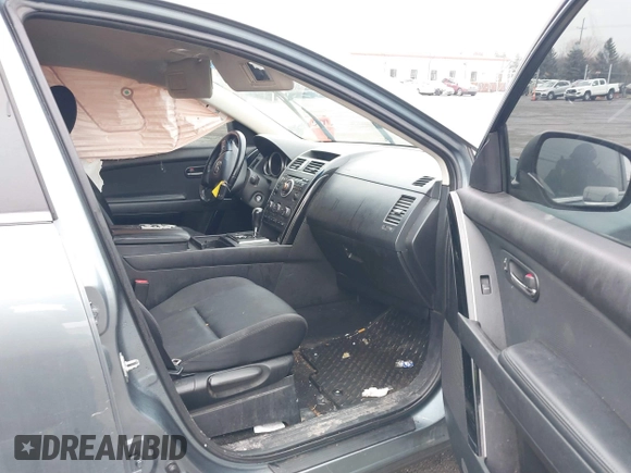 2012 Mazda CX-9 Sport with VIN JM3TB3BV9C0366505, listed as a IAAI auction lot 41474588 with 161,079 mi miles and . Bid and sale history available at DreamBid. Image 5.
