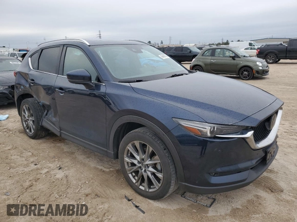 2021 Mazda CX-5 Signature with VIN JM3KFBEY9M0343758, listed as a Copart auction lot 46469785 with 41,757 mi miles and Salvage Title. Bid and sale history available at carsss.com. Image 4.