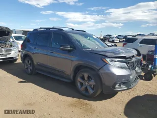 2020 Honda Passport Touring with VIN 5FNYF8H93LB011244, listed as a Copart auction lot 68113584 with 31,232 mi miles and Salvage Title. Bid and sale history available at carsss.com. Image 4.