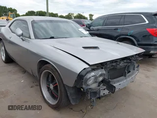 2016 Dodge Challenger SXT Plus z VIN 2C3CDZAG9GH184110, wystawiony jako IAAI lot #42463784 z przebiegiem 160 484 mil mil oraz . Historia ofert i sprzedaży dostępna na DreamBid. Obrazek 1.