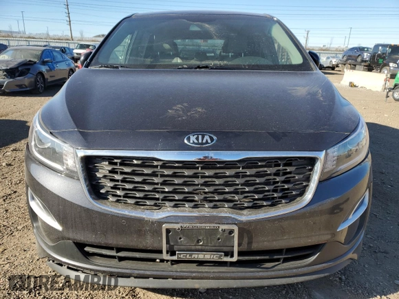 2021 Kia Sedona LX with VIN KNDMB5C1XM6671806, listed as a Copart auction lot 83027514 with 58,884 mi miles and Salvage Title. Bid and sale history available at carsss.com. Image 5.