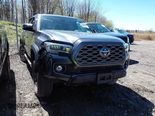 2023 Toyota Tacoma 4WD SR with VIN 3TMCZ5AN4PM625017, listed as a IAAI auction lot 41207111 with 38,582 mi miles. Bid and sale history available at carsss.com. Image 1.