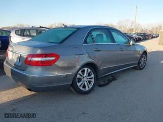 2011 Mercedes-Benz E-Class E 350 Luxury with VIN WDDHF8HBXBA431387, listed as a IAAI auction lot 41724122 with 138,688 mi miles. Bid and sale history available at carsss.com. Image 4.