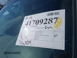 1999 Toyota Sienna LE with VIN 4T3ZF13C5XU099020, listed as a IAAI auction lot 41709287 with 206,884 mi miles. Bid and sale history available at carsss.com. Image 17.