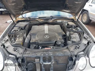 2004 Mercedes-Benz E-Class 5.0L with VIN WDBUF70J14A522118, listed as a IAAI auction lot 41786440 with 153,325 mi miles. Bid and sale history available at carsss.com. Image 10.
