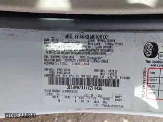 2007 Ford Fusion SE with VIN 3FAHP07117R214430, listed as a IAAI auction lot 41808246 with 132,042 mi miles. Bid and sale history available at carsss.com. Image 9.
