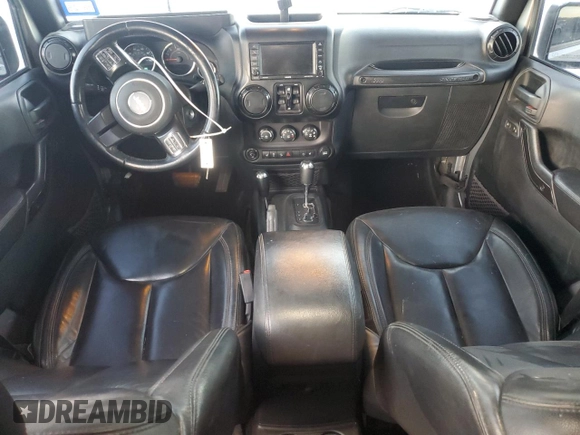 2017 Jeep Wrangler Unlimited Sahara with VIN 1C4HJWEG8HL697341, listed as a Copart auction lot 81313424 with 118,693 mi miles and Salvage title. Bid and sale history available at DreamBid. Image 8.