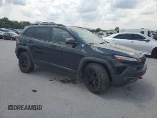 2015 Jeep Cherokee Trailhawk with VIN 1C4PJMBS7FW577826, listed as a Copart auction lot 54933105 with 163,751 mi miles and Clean title. Bid and sale history available at DreamBid. Image 4.