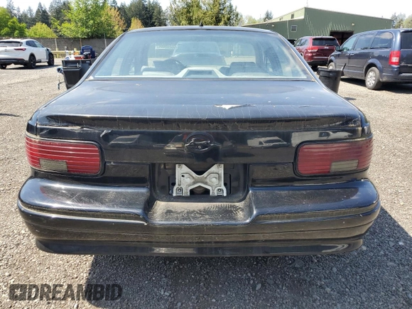 1996 Chevrolet Caprice 1SA Special Value with VIN 1G1BL52P7TR120054, listed as a Copart auction lot 55260005 with 213,627 mi miles and Clean Title. Bid and sale history available at DreamBid. Image 6.