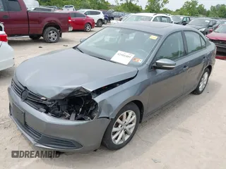 2012 Volkswagen Jetta SE z VIN 3VWDP7AJ2CM009780, wystawiony jako IAAI lot #42501489 z przebiegiem 122 185 mil mil oraz . Historia ofert i sprzedaży dostępna na DreamBid. Obrazek 16.