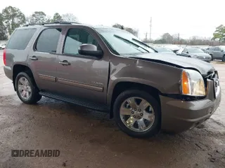 2014 GMC Yukon SLT with VIN 1GKS1CE00ER164663, listed as a IAAI auction lot 41547771 with 178,998 mi miles. Bid and sale history available at carsss.com. Image 1.