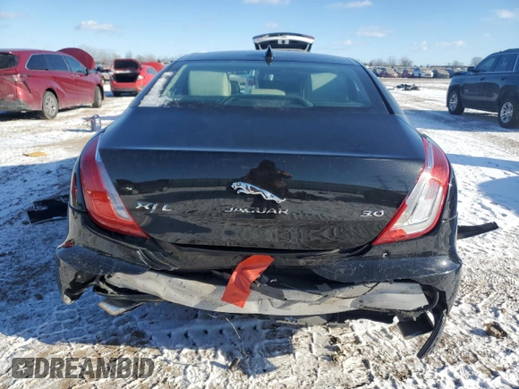 2016 Jaguar XJ Portfolio with VIN SAJWA2G78G8V94534, listed as a Copart auction lot 86926944 with 144,093 mi miles and Salvage title. Bid and sale history available at DreamBid. Image 6.