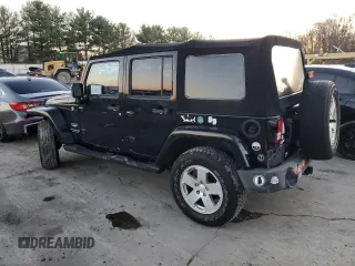 2007 Jeep Wrangler Unlimited Sahara with VIN 1J8GA59117L188579, listed as a Copart auction lot 79823624 with 68,322 mi miles and Clean Title. Bid and sale history available at carsss.com. Image 2.
