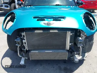 2017 MINI Convertible Cooper S z VIN WMWWG9C30H3C80917, wystawiony jako IAAI lot #42227320 z przebiegiem 38 490 mil mil oraz . Historia ofert i sprzedaży dostępna na DreamBid. Obrazek 6.