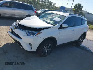 2018 Toyota RAV4 XLE with VIN JTMWFREV8JJ157496, listed as a IAAI auction lot 41816017 with 64,767 mi miles. Bid and sale history available at carsss.com. Image 2.