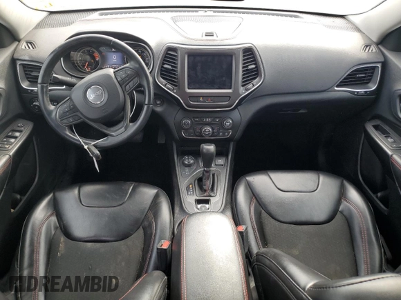 2019 Jeep Cherokee Trailhawk with VIN 1C4PJMBX8KD314746, listed as a Copart auction lot 51801135 with 124,281 mi miles and Salvage title. Bid and sale history available at DreamBid. Image 8.