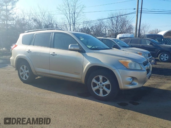 2010 Toyota RAV4 Ltd with VIN JTMDF4DV1A5020971, listed as a IAAI auction lot 41336888 with 214,838 mi miles. Bid and sale history available at carsss.com. Image 1.